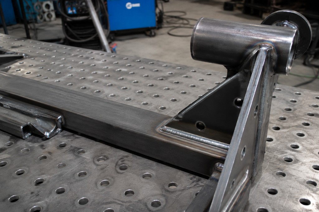 Custom welded steel frame fabricated on a fixture table